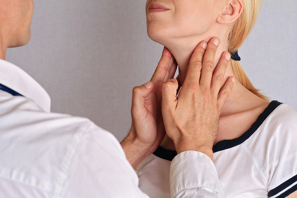 Woman getting thyroid gland control. Health care and medical concept
